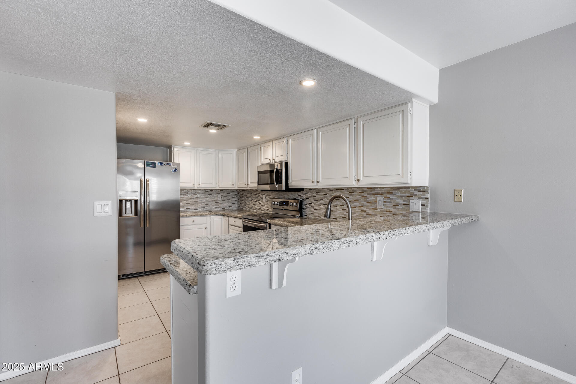 11217 E LAUREL Lane