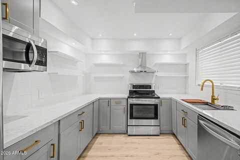 Photo of 1650 N 87th Terrace #2B, Scottsdale, AZ 85257 (MLS # 7009137)