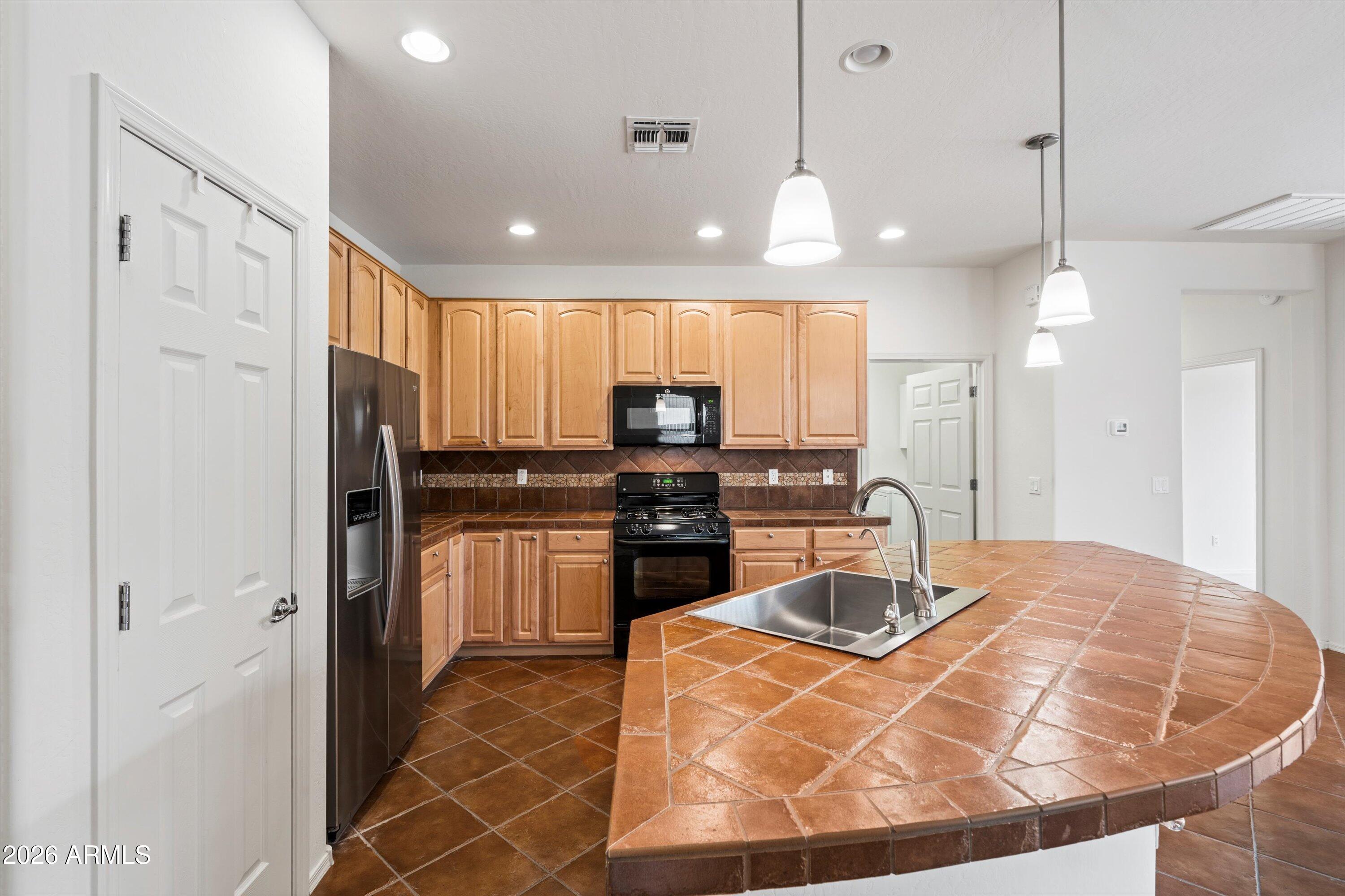 Properties 2 42406 W FALLING STAR Drive