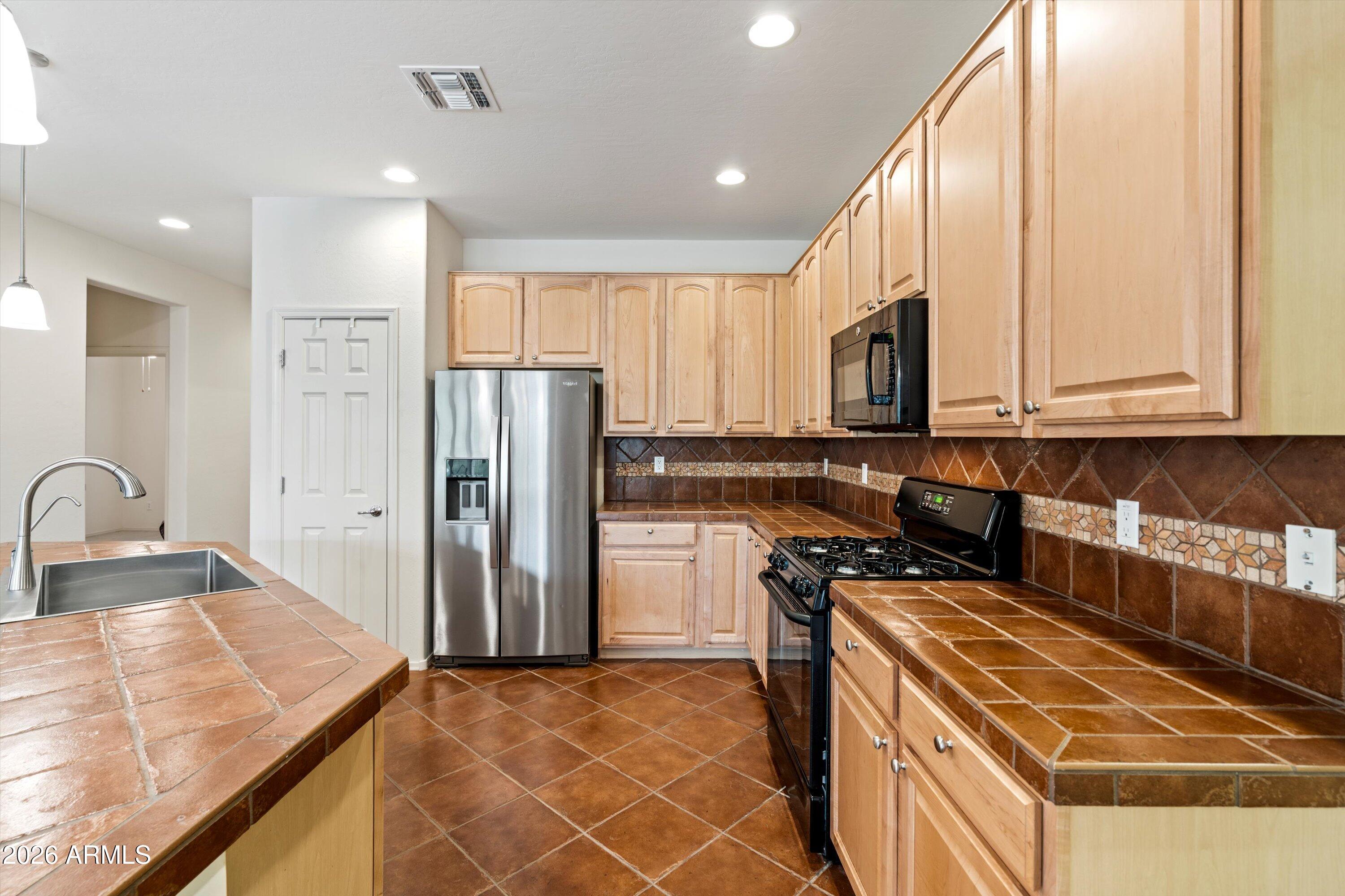 Properties 3 42406 W FALLING STAR Drive