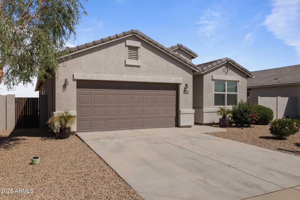 Photo of 36034 W Madrid Avenue, Maricopa, AZ 85138 (MLS # 6925287)