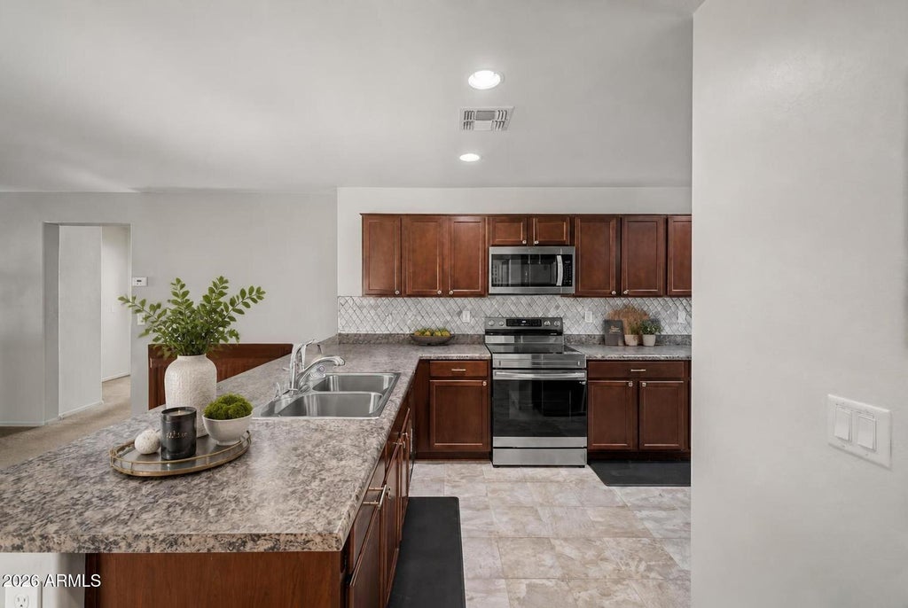 Photo of 40858 W Portis Drive, Maricopa, AZ 85138 (MLS # 7067685)
