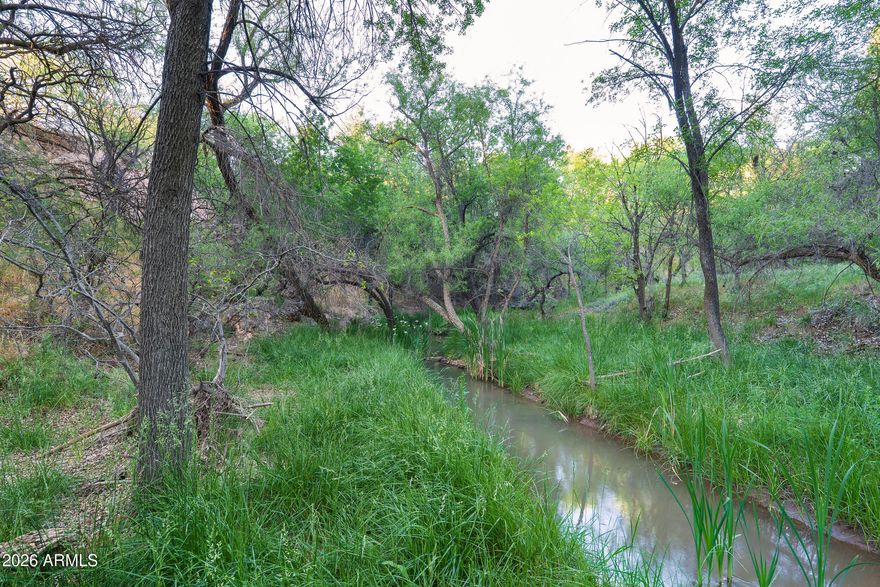 Have you ever dreamed of owning property with a running stream going right through it? Well, look no further, you found it! 

This beautiful 1.2ac level lot in Cornville benefits from existing improvements: power and a water well. 

The top portion is flat, easily buildable, and has sublime views of Mingus Mountain and tons of privacy with matures trees all around. 

The lot slopes down to a tributary of Oak Creek which acts as an irrigation ditch, going through the neighborhood. It runs year-round and pauses a couple weeks in the winter for maintenance. 

The waterway has a setback as per Yavapai County and the building envelope for a house is up top, on the flat portion (see attached document). The bottom portion is usable for your own enjoyment! The waterway has a setback as per Yavapai County and the building envelope for a house is up top, on the flat portion (see attached document). The bottom portion is usable for your own enjoyment!