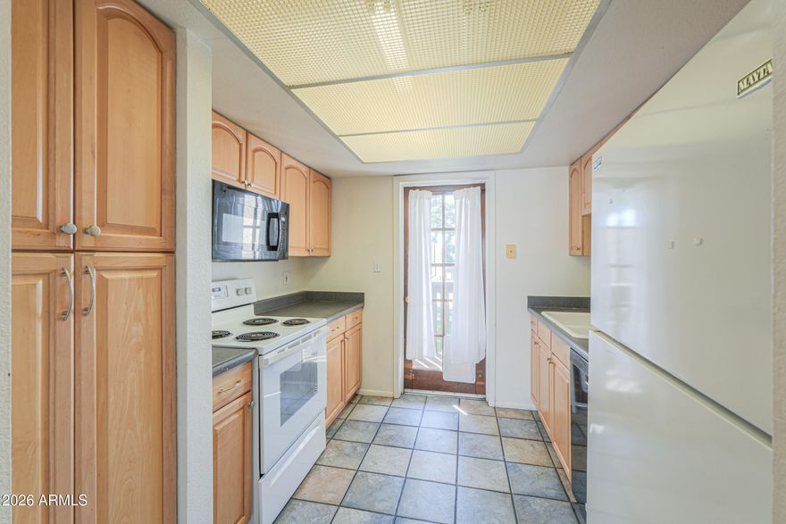 Welcome to this charming 2 bed, 2 bath condo in Mesa Grande offering 988 sqft of living space! Enjoy tons of natural light in the spacious living area and a primary suite featuring a large walk-in closet. This unit is ideally located close to the community pool and includes a private balcony and covered carport parking. The community offers fantastic amenities including a pool, clubhouse, tennis & basketball courts, BBQ areas, picnic tables, and shaded greenbelts. Conveniently located near downtown Mesa & Gilbert, with easy access to the 60 freeway, shopping, and dining.