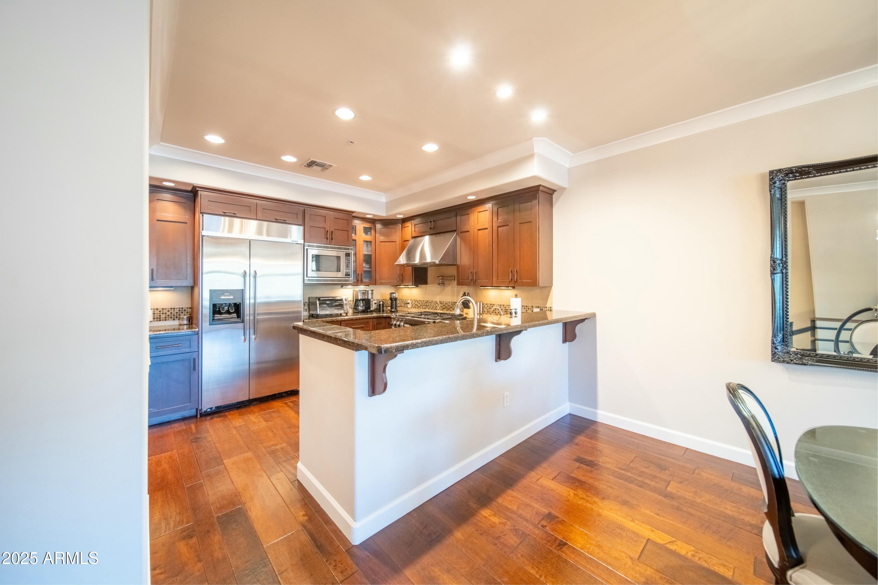 4909 N WOODMERE FAIRWAY -- 2003