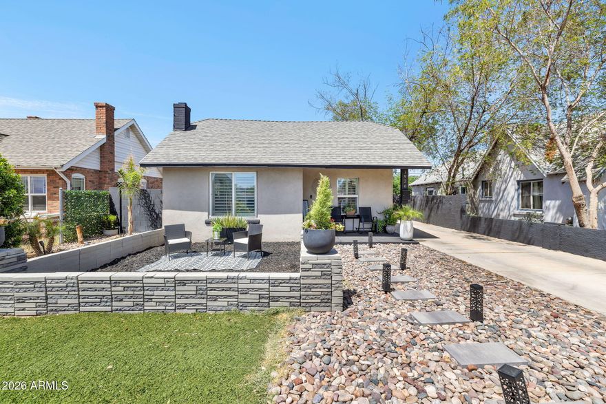 PROPERTY HAS AN ASSUMABLE LOAN FOR 4.125%

Fully remodeled single story stunner in the Villa Verde Historic District, just minutes from Downtown Phoenix! This 2 bed, 2 bath beauty delivers the perfect mix of charm and modern upgrades featuring a cozy wood burning fireplace, paint, shutters, granite countertops, newer appliances, and newer AC.

The primary suite includes a walk in closet, while the updated front landscaping creates standout curb appeal. Sitting on a large, versatile lot, there is room to add a pool, guest house, or ADU plus 2 storage sheds and NO HOA.

Prime location near the Fairgrounds, airport, freeways, and downtown hotspots. Move in ready with major upside don't miss it!