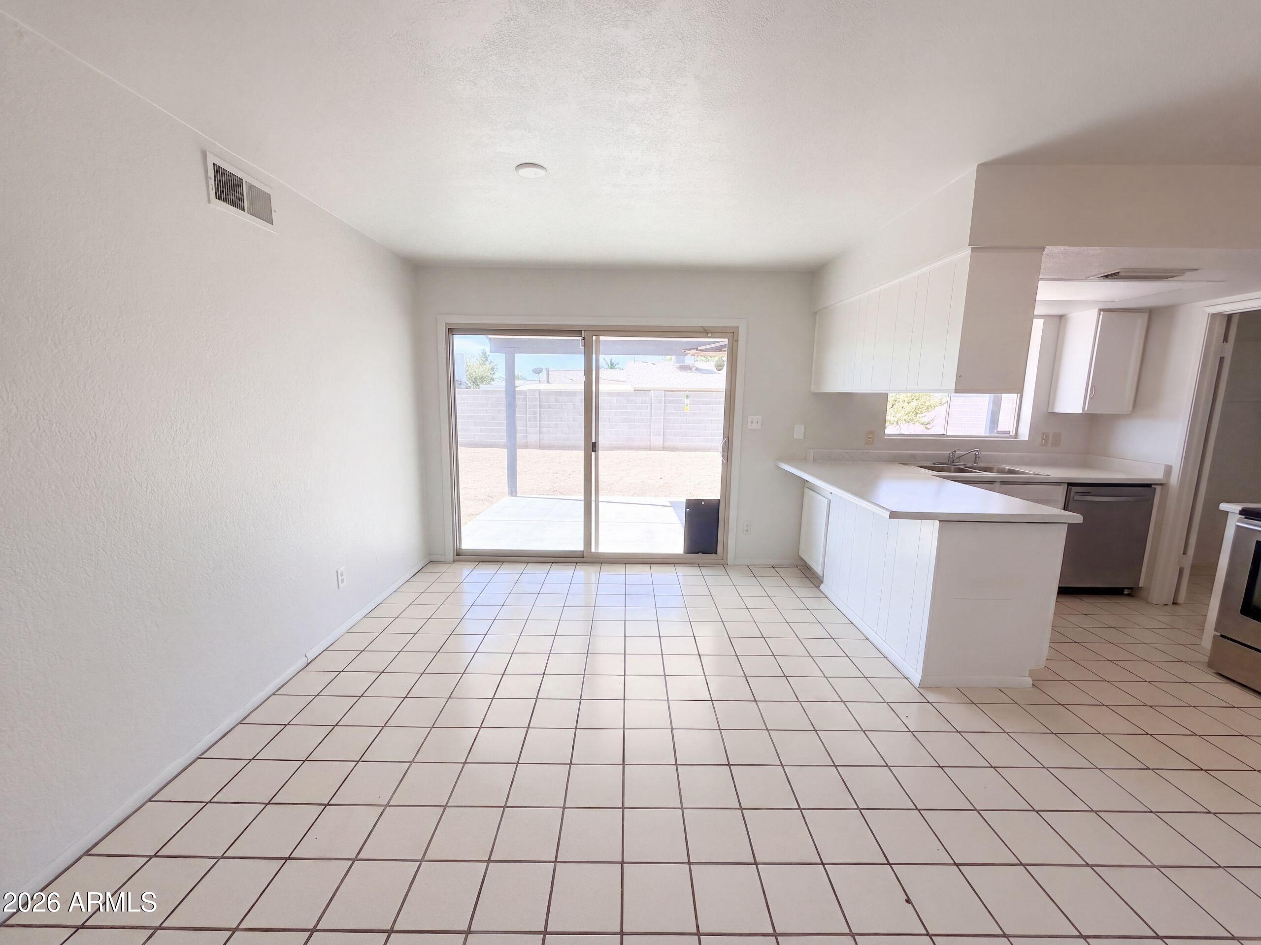 1413 W BEHREND Drive