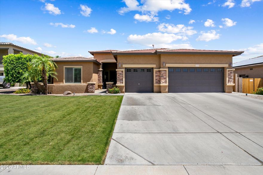 Pride of ownership. Single level 4 BD 2.5 Bath with an office. Split floor plan. Tile flooring throughout with carpet in all the right places.
Meticulous landscaping with grass front and back. Enjoy the sparkling pool with waterfall and natural gas heated spa.
Gas fireplace in family room and gas fireplace in back yard.
3 car garage with electric car charging system.
Near numerous restaurants, shops and Surprise Stadium in fast growing Surprise, Arizona.
Don't miss this one!