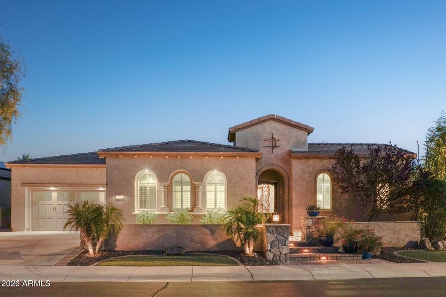 ''WOW-THIS PROPERTY IS STUNNING'' This Pristine home is located in the Award Winning Community of Trilogy at Vistancia!! Rare to find Spiritus w/ detached private Casita on an Oversized lot! Step inside & admire the stunning CUSTOM WOODWORK & Luxury finishes throughout!!  The wood-flooring is a showstopper and the dramatic STONE Fireplace is the perfect touch.  The Chef's Kitchen is equipped with Monogram DOUBLE OVENS, a WARMING Drawer, a true BUILT-IN SUB ZERO Fridge & Custom HOOD VENT.  Enjoy high-end RAISED-PANEL cabinetry, granite slab w/ custom backsplash and oversized SINK! CUSTOM TILE IN Owners SUITE is impressive and the CROWN MOLDING & Wood BEAMS makes a statement that no detail was missed!  The outdoor living is paradise and a great space to entertain w/ 2 private courtyards w/ pergolas, massive extended PAVER patios, soothing water / fire feature, Built-in BBQ and a gorgeous GAS FIREPLACE.  Truly One-of-a-Kind