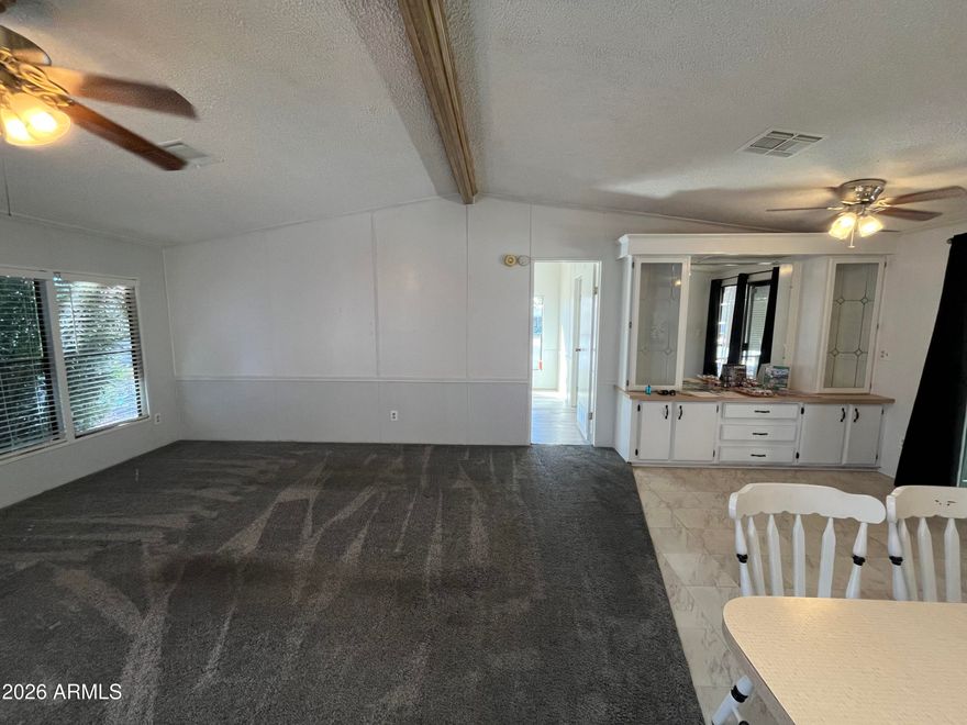 SPACIOUS WIDE OPEN FLOOR PLAN! This 2Bed/2Bath home has an extra Craft/Office space as well as a great PRICE! A large storage shed, a cozy porch to enjoy early morning sunsets! Sellers are motivated! Dont miss this great deal! Located in a highly sought after community of Rose Garden. A gated 55 plus age restricted resort style community. Community features heated pool, spa, sauna, pickleball, 2 dog parks, one even has agility equipment. Tons of activities.