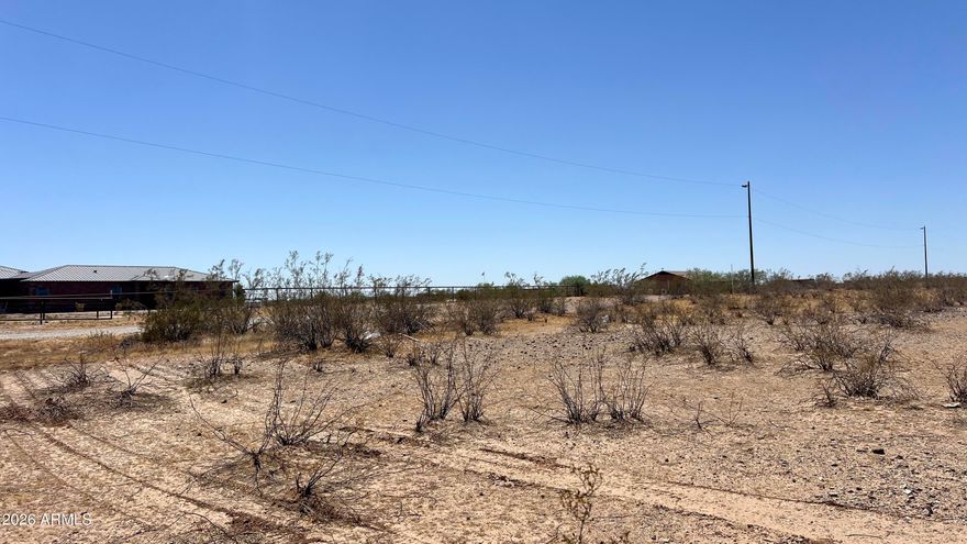 Great Acre+ flat buildable lot in Wittman.  Lot includes shared well.  Power is right on 235th Ave.  Lot is NOT located in flood.  Bring your vision, horses and toys.