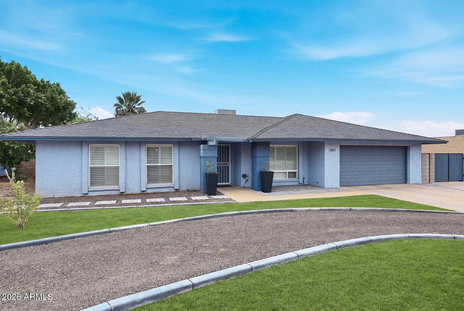 1037 E ACOMA Drive