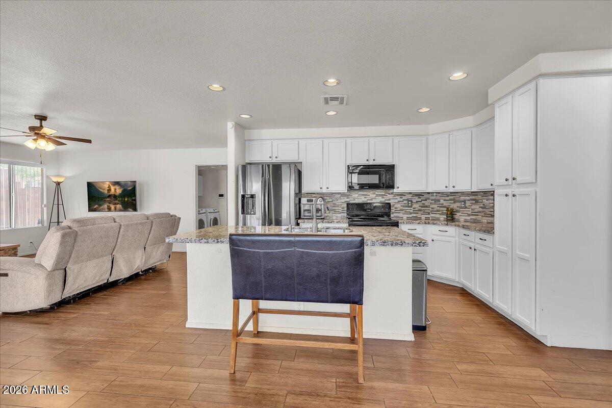 6366 E RIVERDALE Street