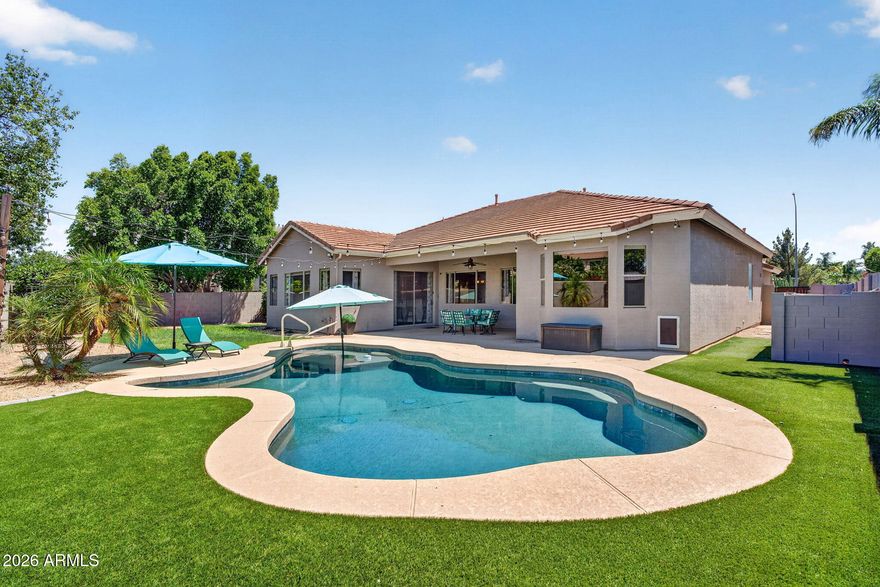 Welcoming curb appeal to this beautifully maintained single story Mesa home. Spacious and open split floor plan offers 4-bedrooms, 2-baths, formal living and dining rooms, & large family room. Expansive windows throughout offering  bright living spaces, comfort & functionality. Kitchen, open to family room with s/s appliances, granite countertops, oak cabinetry, large island, breakfast bar, & pantry. The split primary suite includes backyard access, dual sinks, walk-in closet, separate tub and shower and private water closet.  Large bonus room works great for home gym, office, game room, etc. Enjoy Arizona living year round in the private backyard with heated pebble tech pool,  covered patio & no neighbors behind you. Augusta Ranch community amenities include award winning 18 hole executive golf course, clubhouse, playgrounds, & biking/walking paths. Conveniently located with nearby access to freeways, shopping, dining, and parks. Location is key and Augusta Ranch is situated where a lot of new growth is in the works! A perfect blend of everything you need close by all tucked away in a quiet community your new home!