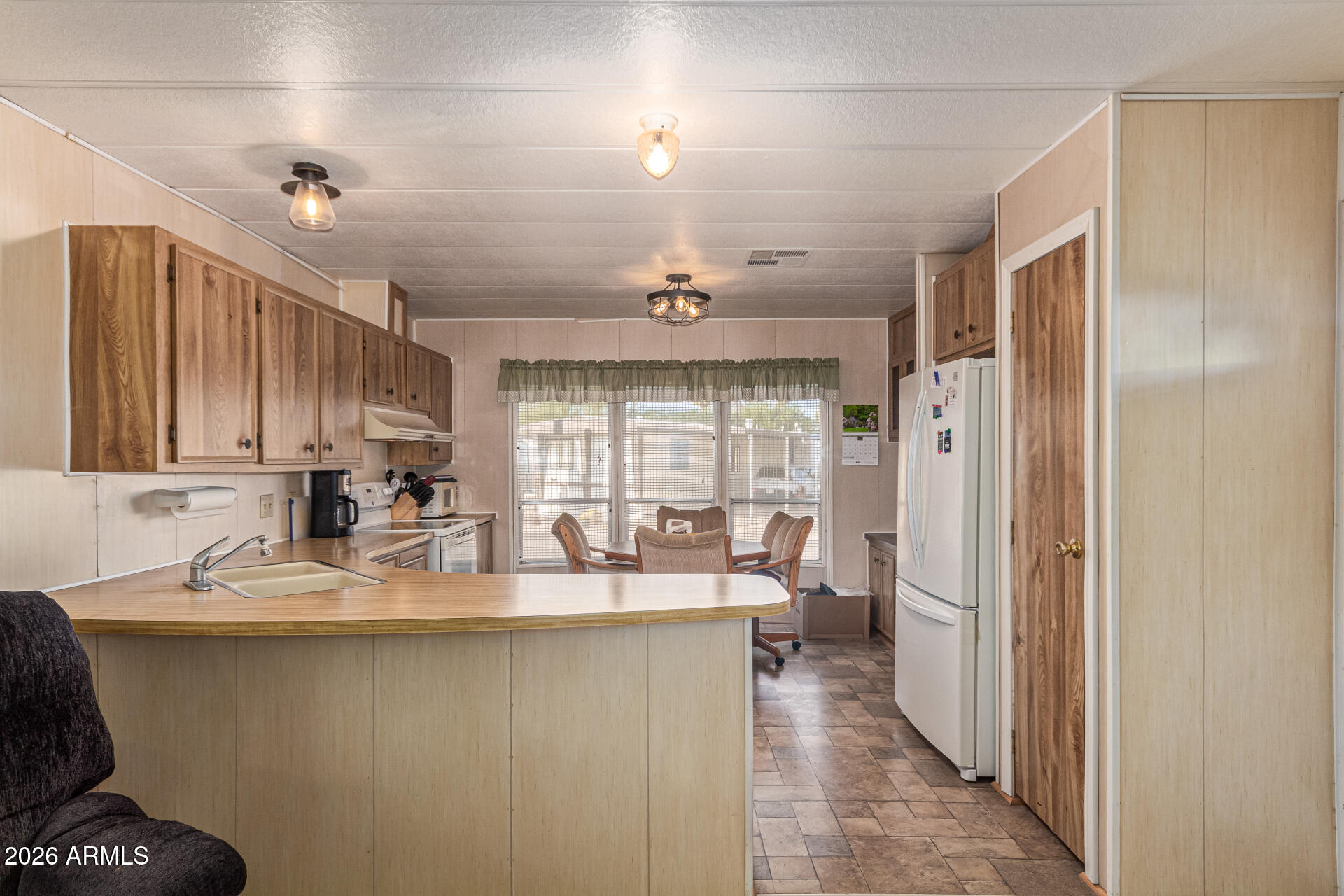 11425 E UNIVERSITY Drive 49