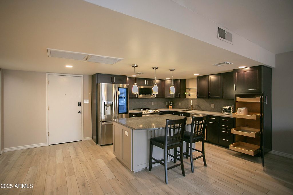 Photo of 7920 E Camelback Road #203, Scottsdale, AZ 85251 (MLS # 6950099)