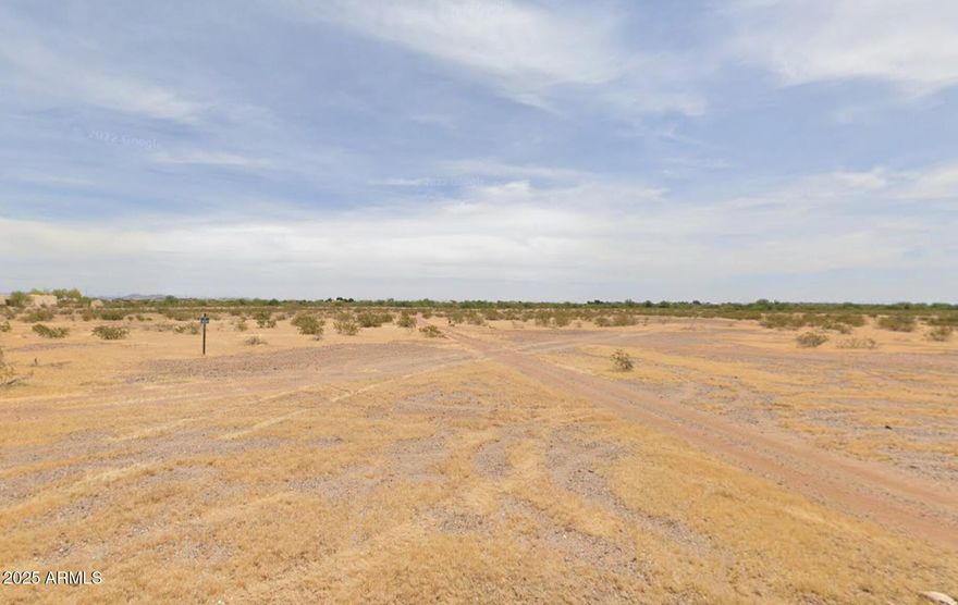 Incredible Industrial Land Opportunity in Wittmann! Explore the potential of this rare 30-acre parcel, ideal for a wide range of industrial, commercial, and business operations. Located in an area experiencing rapid growth, this property offers endless development possibilities for those looking to establish or expand their industrial footprint. Current county zoning allows for numerous uses—manufacturing, distribution, warehouse facilities, contractor yards, equipment storage, resale of building materials, wholesale and retail trade,  Agricultural use options may also exist. Buyers are encouraged to confirm all intended uses, zoning designations, and restrictions with Maricopa County and appropriate authorities. This an outstanding choice for long-term investment or immediate development