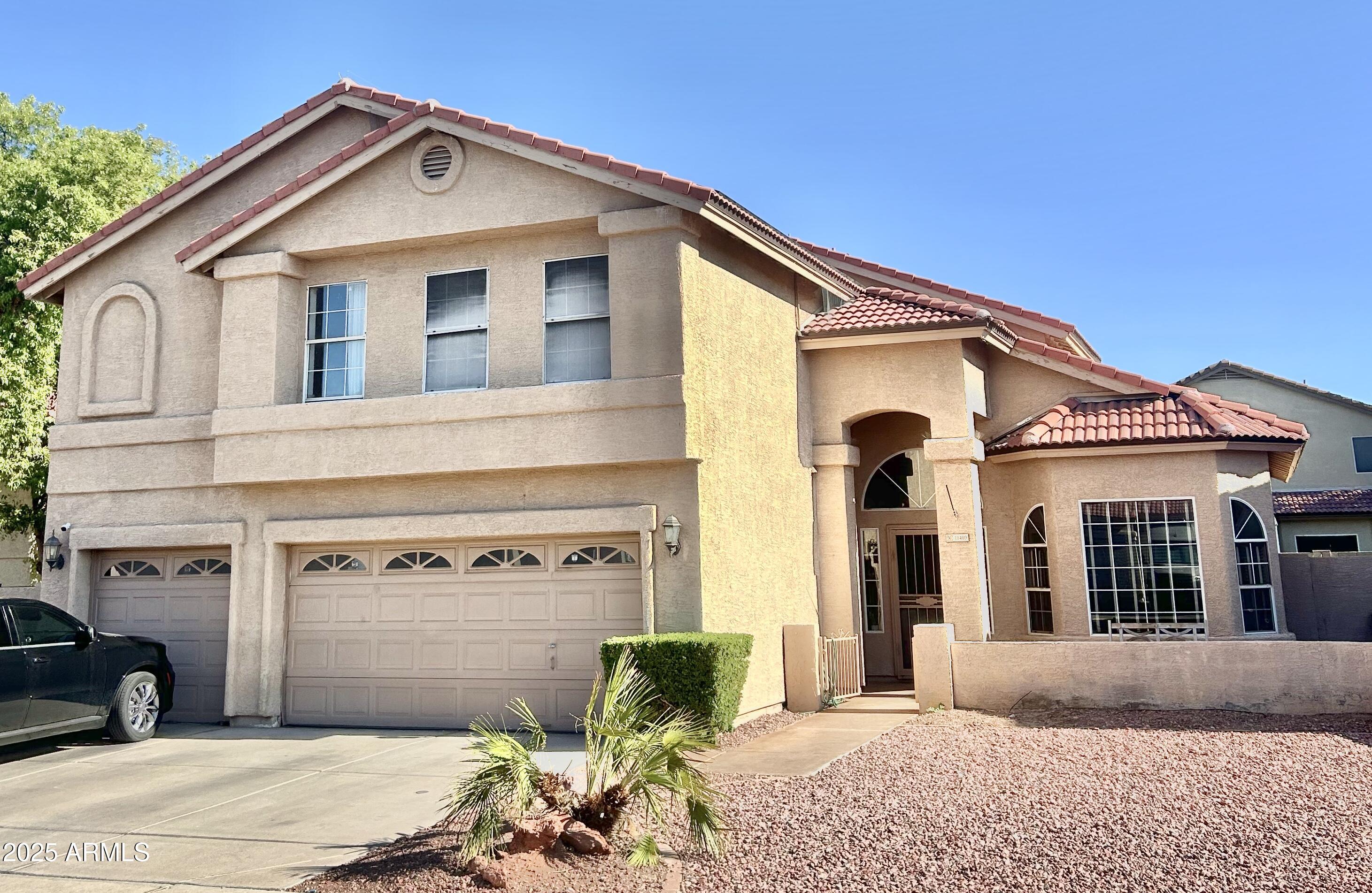 11410 W ORANGE BLOSSOM Lane