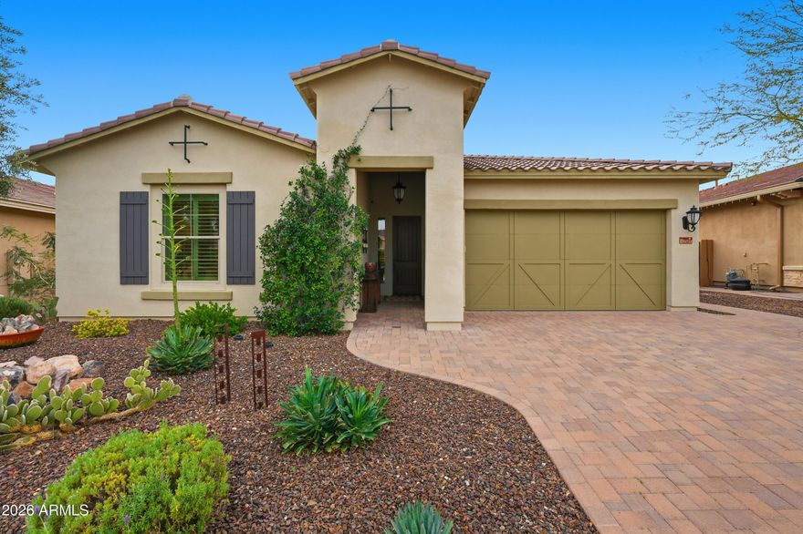 Welcome to Desert Living at Its Finest. Perched on an elevated golf course lot within the prestigious guard-gated community of Blackstone at Vistancia, this stunning 4-bedroom, 3.5-bath residence offers the ultimate Arizona lifestyle with breathtaking golf course and mountain views. Designed for both relaxation and entertainment, this home seamlessly blends indoor comfort with outdoor luxury.

The heart of this home features an open-concept living area flooded with natural light, creating an inviting space for everyday living and entertaining. A dedicated office provides the perfect work-from-home sanctuary, while multiple living spaces throughout ensure comfort for family and guests alike. The thoughtful floor plan includes a fully en-suite guest bedroom, ideal for extended family or visitors seeking privacy and comfort. All other guest rooms have designated bathrooms for added comfort and practicality, ensuring everyone enjoys their own space.

The generously sized primary suite serves as a private oasis, purposefully separated from the other living areas to ensure maximum tranquility. The spa-inspired primary bathroom is designed for total relaxation, featuring a spacious walk-in shower, large soaking tub, and an expansive walk-in closet with abundant storage.

Step outside to discover your own private resort. Expansive sliding doors create a seamless indoor-outdoor flow, opening to a covered entertaining area perfect for Arizona's year-round enjoyment. The backyard showcases a sparkling pool, rejuvenating spa, built-in BBQ area, and generous space for outdoor seating and lounging. Beautifully landscaped with mature lavender and other low-maintenance plants, the outdoor space delivers resort-style living with ease. Whether hosting gatherings or enjoying quiet evenings, this is Arizona living at its best.

Additional highlights include a three-car garage with ample storage throughout, a raised lot position that provides enhanced golf course views and privacy, and a quiet, private setting within the guard-gated, award-winning Blackstone community. With the championship Jim Engh-designed golf course at your doorstep and proximity to the world-class Blackstone Country Club, this is more than a home--it's a lifestyle. Experience the perfect combination of luxury, location, and leisure at 12381 Gilia.