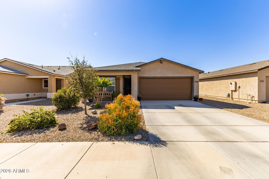 Seller offering $20,000 credit for Solar, Rate Buydown, Closing Costs, or whatever you'd like to use it for!!! Buydown 4.9% for Qualified Buyers, save over $300 a month off your payment vs market rate! Awesome home in Picacho Crossing For Sale! Beautiful desert landscaping and curb appeal greet you as you drive up, with a front patio to enjoy. The inside has a great floorpan, tall ceilings with ceiling fans throughout, and neutral vinyl flooring. You'll love the kitchen with beautiful white cabinetry, stainless steel appliances, pantry, and opens to the family room. The primary bedroom is spacious, able to fit larger furniture, with walk-in closet and primary bathroom. The secondary bedrooms are good size, with shared secondary bathroom. The backyard is already landscaped, with plenty of grass space for kids or pets, and stone and paver patio. If that's not all, enjoy the 2 car garage, inside laundry, and solar to keep utilities low. Welcome home!