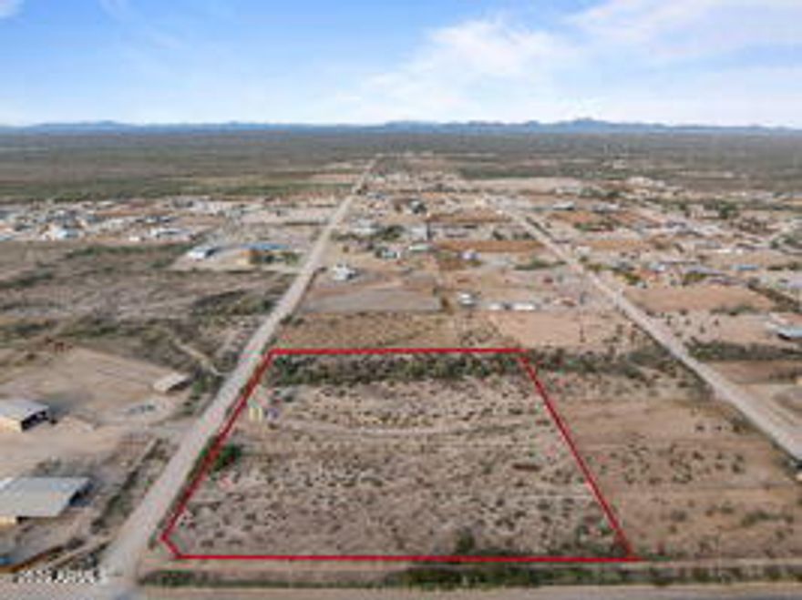 Income-producing opportunity in the heart of Wittmann's sought-after roping community! This fully fenced 4.383-acre parcel offers a rare combination of infrastructure, approved development work, and western lifestyle potential. Included in the purchase price are approved building plans designed with flexibility in mind—ideal for a large family home or a rental investment. The floor plan is designed to allow the property to be rented out up to four separate ways, offering privacy and strong income potential.Extensive groundwork has already been completed, including approved plans, perk test, planning & drainage completion, making this property truly build-ready. Equestrian improvements are already in motion as well, with 20 stalls approved and permitted, along with an approved arena, creating the perfect setup for serious horse enthusiasts.

The land is flat, usable, and serviced by a private well with two 5,200-gallon holding tanks and dual pressure system pumps, providing an excellent foundation for future development. Located just off a paved road, this parcel offers easy year-round access while maintaining a peaceful rural setting.

Enjoy being only 10 minutes from Fry's and Starbucks, approximately 20 minutes from Lake Pleasant, and just 20 minutes to Wickenburg, all while surrounded by a strong western lifestyle community. This is a rare opportunity to own a well-improved property with both investment potential and equestrian-ready possibilities in one of Arizona's most desirable horse property locations.