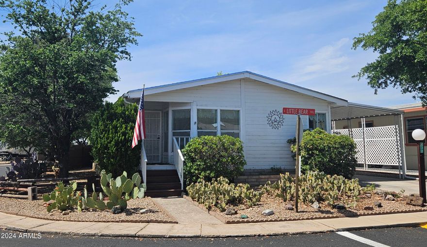 2 bedroom, 2 bath home on a larger corner lot close to both clubhouses. Gated community. 2 large bedrooms, large utility room and master bath. 2 walk in closets Tall wooden privacy fence around the backyard. A small garden area and private sitting area.