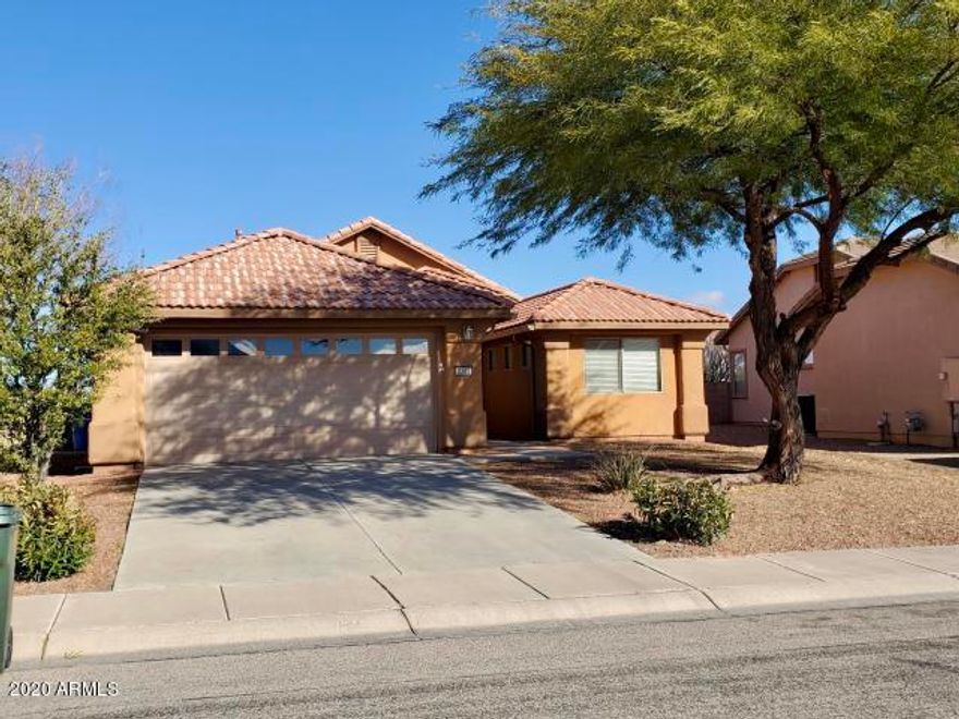 Current owner doesn't love the AZ heat, so after upgrading features of the home they have decided to move.  Ready to move in 3 bedroom, 2 bathroom home in Coronado Crossings. This property sits above neighbors, with a greenbelt area behind home and a recently landscaped backyard.  Block wall has view panels to increase that open feel. Inside there is open concept living, with spacious laundry area (lots of room to add cabinets or a wall locker system), large Master Bedroom with back patio access, gas fireplace, covered patio with wonderful views, new landscaping in front and back, solar tubes, partial gutters added, new water softener, and MORE!!!