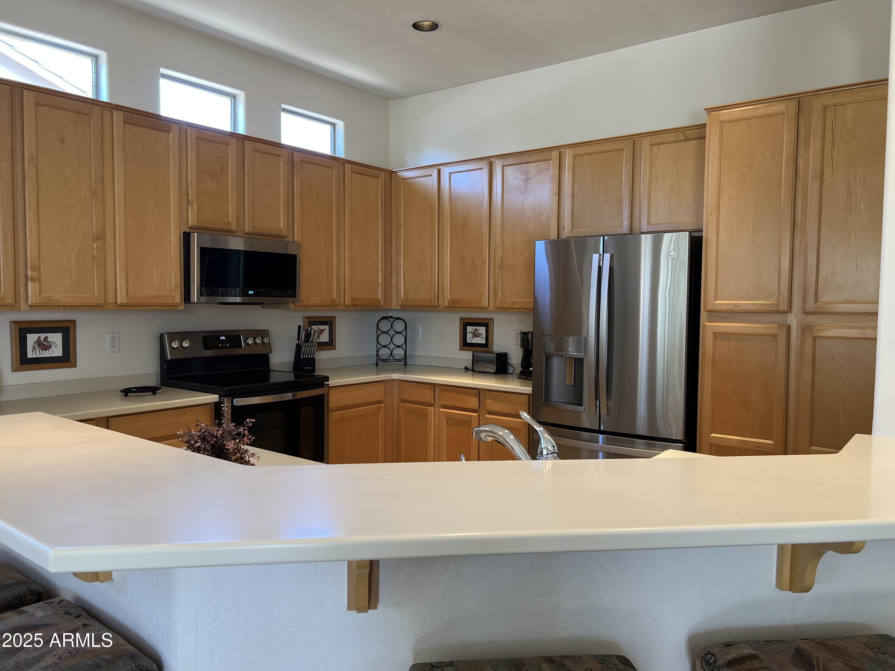 9044 N LONGFEATHER Road