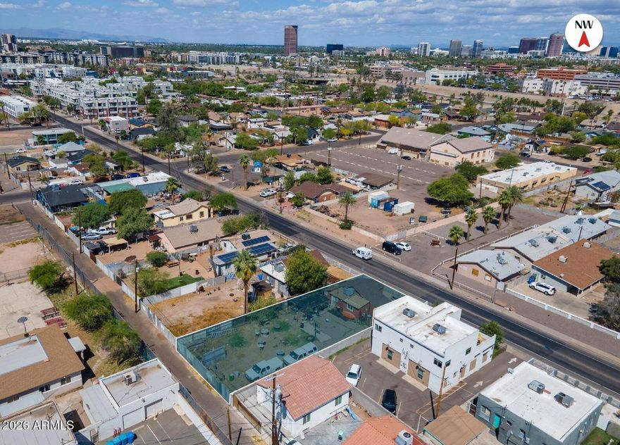 Seller financing available with a minimum 25-30% down, competitive rate, and flexible terms. Prime redevelopment opportunity in the Garfield Historic District, zoned R-5 Multiple Family Residence. 6, 875 SF lot with an existing 714 SF structure and alley access. Potential to build up to 6-8 attached units, subject to City of Phoenix approval. Situated blocks from Roosevelt Row, Chase Field, Banner University Medical Center, and the Phoenix Convention Center. Minutes from Downtown Phoenix, ASU Downtown Campus, and the Arizona Science Center with easy access to I-10 and SR-51.