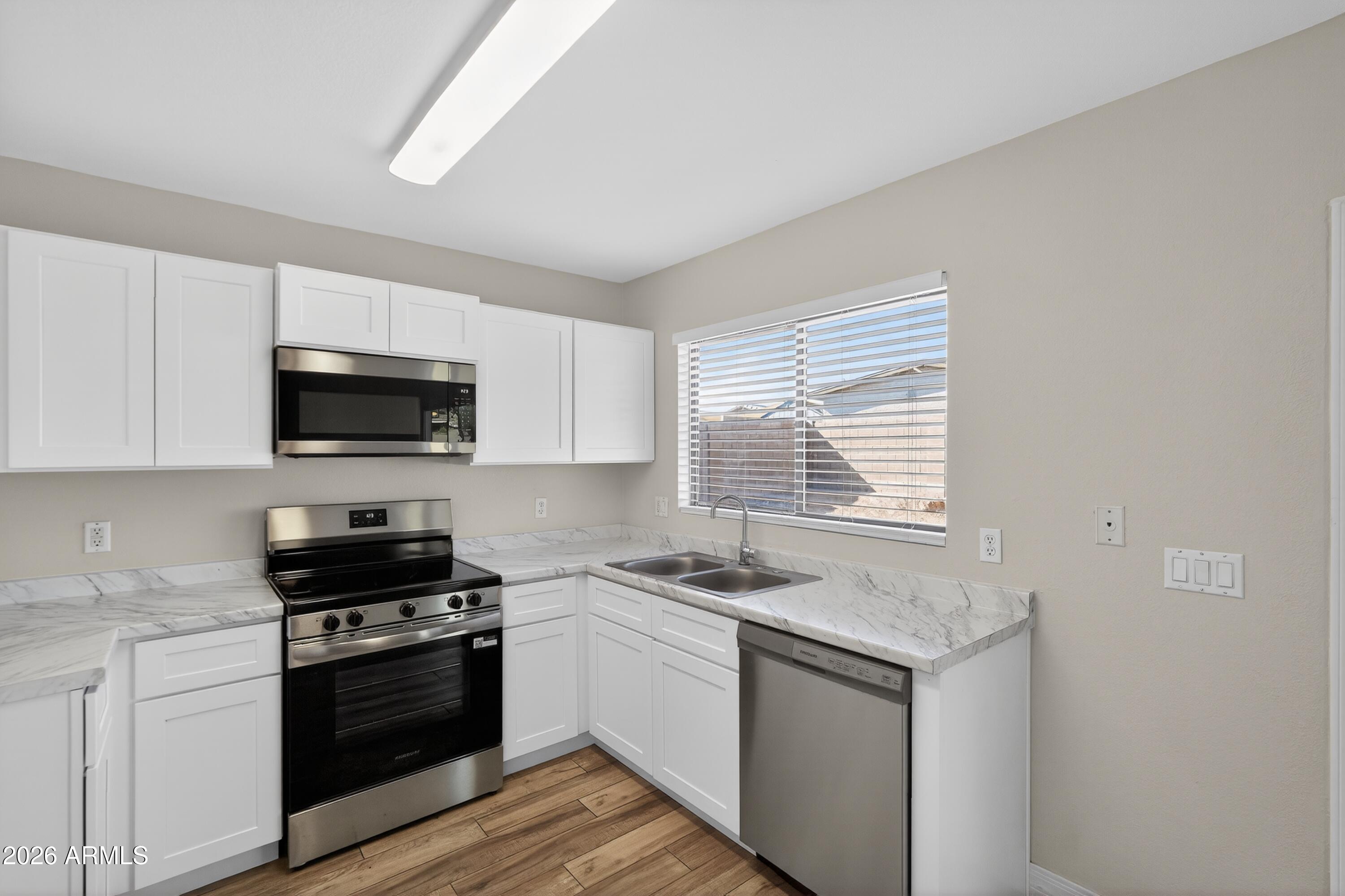 7566 W COLTER Street