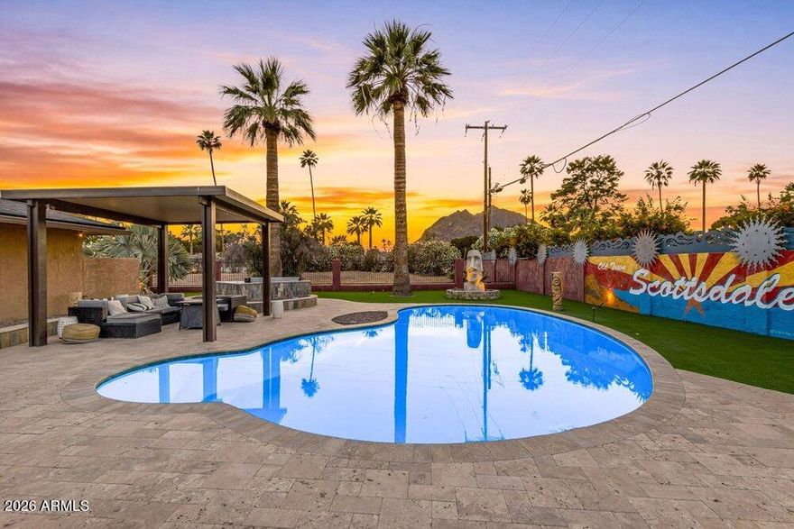 Set in one of Scottsdale's most sought-after locations, with striking views of Camelback Mountain, this beautifully nearly 3,500 square foot home offers 3 bedrooms and 2.5 bathrooms, and captures the essence of desert living. Currently operating as a high-performing Airbnb, it presents a rare opportunity for investors or those seeking a turnkey home.

Owned solar provides added efficiency, while the chef's kitchen is anchored by a Miele refrigerator and premium appliances, seamlessly connecting to the main living spaces complete with fireplace. Elevated finishes and a clean, modern aesthetic carry throughout, creating a space that feels both refined and inviting.

The backyard is designed for true Arizona living. Complete with a pool and spa, built-in BBQ and bar, and a large turf area for entertaining or relaxing, all set against the backdrop of Camelback Mountain. Just beyond the backyard gate, additional land offers the opportunity to build, making it an ideal setup for a future casita or expanded space.

All within walking distance to Old Town Scottsdale's dining, shopping, and nightlife, this home delivers on location, lifestyle, and income potential.