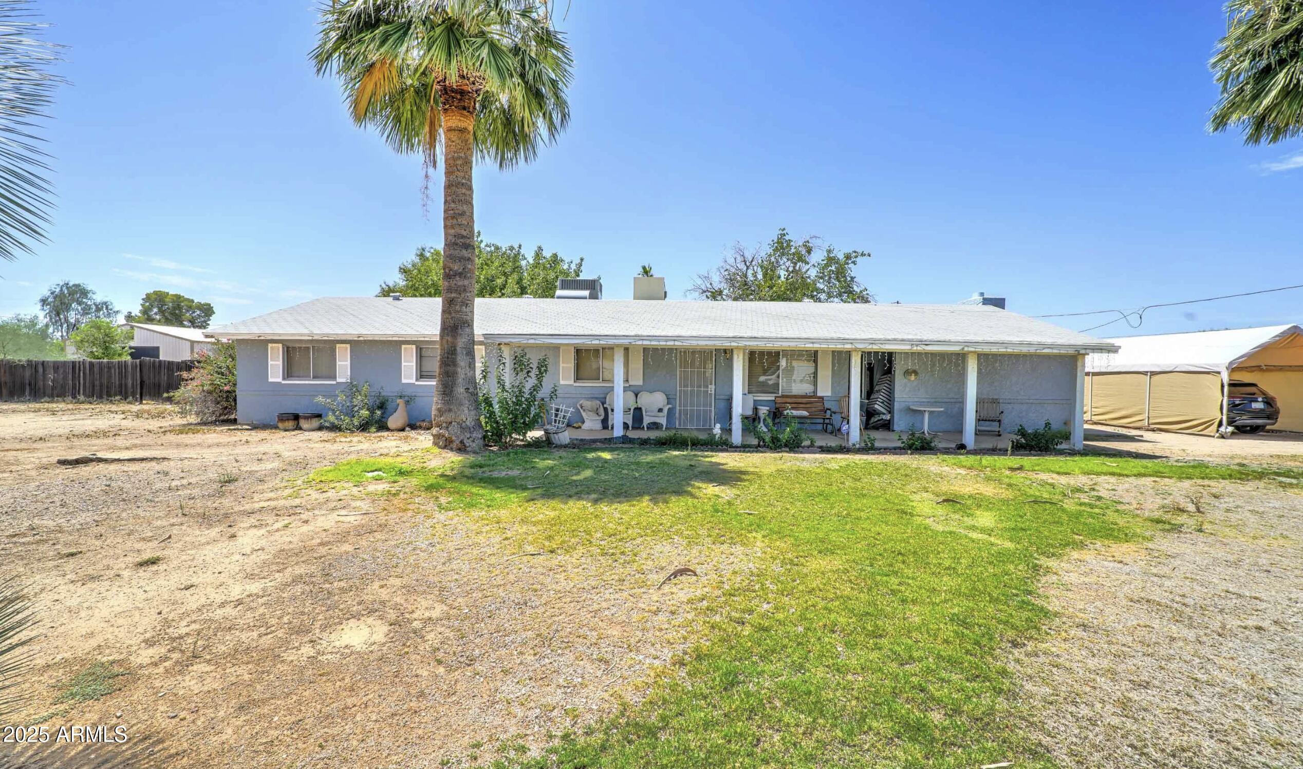 6861 E CHOLLA Street