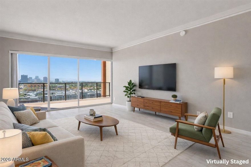 One of the most unique condos in town--no neighbors on either side--offering exceptional privacy and a peaceful balcony experience for sunrises and sunsets. Rare 14th-floor home with unobstructed south-facing views down Central Ave, capturing South Mountain and the downtown skyline. Interior features include new wood-look ceramic flooring and granite countertops. The building has seen major upgrades including new chillers, hot water heaters, and elevators, along with recently revamped balconies--helping owners avoid a significant expense. HOA includes all utilities except plug-in electric. Located in the northernmost mid-century modern high-rise in highly desirable Uptown, with close proximity to the light rail, dining, and shopping.  Your friends will beg you to host a 4th of July party!