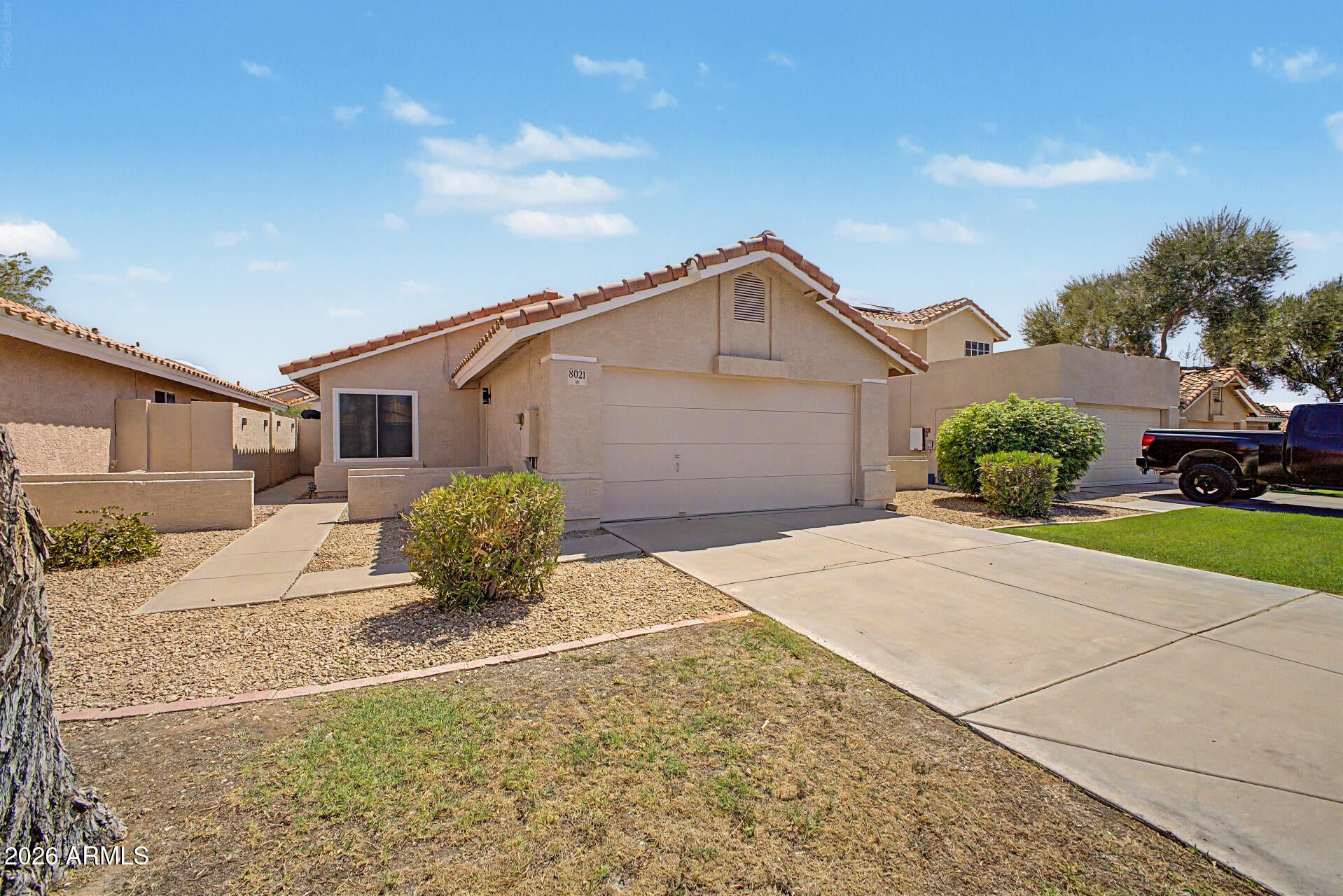 8021 W PARADISE Drive