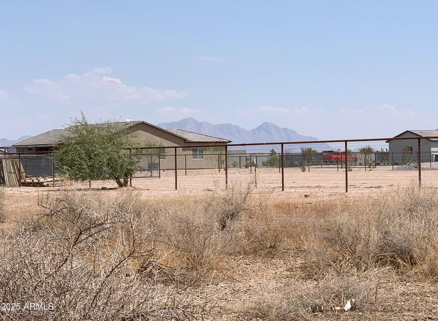 This 1.46-acre Parcel is perfect for your New Homesite! Situated just east of Curry Road in Casa Grande's fast-growing corridor, this lot is nearby major developments like Attesa Motorsports New Podium Club Road Racing Circuit, Lucid Motors, Procter & Gamble, Kohler, Abbott, Hexcel, Daisy, WalMart Distribution Center and Frito-Lay. Power lines are available along Curry Road and is not located in a flood zone! One additional parcel is available! Embrace Country Living in Peaceful Serenity--Wide Open Spaces & Your New Homesite Away From The Hustle Bustle of the City, Pure Bliss!