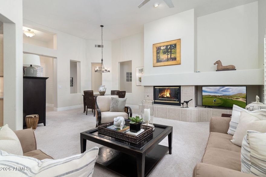 Rare Flora greatroom model set on a bright, private, North/South lot that backs to a natural preserve and is located in the center of Terravita away from any roads in a quiet peaceful setting. The Flora is coveted because of the large great room and one of Terravita's largest secondary bedrooms, and eat in kitchen and a large window over the sink. What will jump out at you is how impeccably maintained this home is and the spotless neutral interior with lots of light throughout. The Primary suite is large and specious and if far from the large second bedroom. The private backyard patio has mature lush green landscaping and is completely private outdoor living. Both the roof and the HVAC have been replaced, and the front yard has plenty of space for either a casita or a frontcourtyard. The 8-inch stepped baseboards are one of the many great features of the home. Here are some other highlights:

HOME HIGHLIGHTS

Impeccably maintained throughout

Quiet interior lot in center of community

North/south exposure

Private setting backing to natural area

No road noise

FLOOR PLAN & INTERIOR

Popular Flora model

Wide-open great room layout

Natural gas fireplace

Two large bedrooms

Eat-in kitchen with large window

Abundant cabinet storage

Clean, neutral interior

Excellent natural light throughout

8-inch stepped baseboards with custom detail

PRIMARY SUITE

Spacious primary bedroom

Separate tub and shower

Walk-in closet

GUEST AREA

Well-sized guest bedroom

Full guest bath

SYSTEMS & CONDITION

Newer high-efficiency HVAC system

Roof replaced

Meticulously cared for home

OUTDOOR LIVING

Private backyard patio

Mature desert landscaping

Room to add casita or expand courtyard

COMMUNITY DESCRIPTION
Dear Prospective Homebuyer,

If you're considering making Terravita your home, know that you're not just buying a property; you're embracing a lifestyle that's rich, engaging, and brimming with opportunities. Terravita stands as a testament to a community that values experiences, relationships, and personal growth over mere bricks and mortar. Here, the house you buy is simply a gateway to the life you desire.

A visit to Terravita's clubhouse and a brief tour of the amenities is essential - it's not just recommended; it's crucial. It is literally what you are buying. If you are just looking for a house, this is likely not the place for you. Dialing 480-488- 3456 can set you on a path to discovering a world where every day is a new adventure. This initial tour is more than just a walkthrough; it's an eye-opener to the vibrant, active lifestyle that awaits you. Many have said that understanding the depth and breadth of Terravita's amenities was a pivotal moment in their decision to join our community.

We invite you to take the first step towards discovering if Terravita is the right fit for you. It's not just about finding a home; it's about finding a place where you can live your life to the fullest. The lifestyle you've dreamed of is here, waiting for you to embrace it. Remember, exploring Terravita starts with a tour of our clubhouse and amenities. Make that choice today and open the door to a world where life is rich, full, and wonderfully yours.

Terravita is a guard gated 823 acre planned community which consists of many amenities including an 18 hole championship golf course, a 39,000 square foot newly remodeled clubhouse facility with 2 dining areas, a heated 25 meter pool with easy beach front entrance and hot tub, 6 tennis courts and a full-time tennis pro, a 13,000 square foot health and fitness center, community-wide 6 mile long walking and jogging trails, and extensive event calendar with fun-filled events for the dozens of social organizations.

Terravita Golf and Country Club has been voted Best Master Planned Community and Best Private Golf Club numerous times by Ranking Arizona. Terravita was created by Del Webb and was their first non-age restricted community. Terravita golf course was created by PGA Hall of Fame member Billy Casper and designer Greg Nash. Terravita golf amenities include a pro shop, a large driving range, and four separate areas to practice chipping and putting.