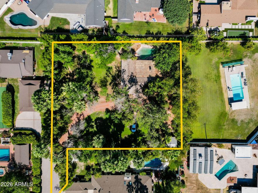 North Central Phoenix OPPORTUNITY! These two parcels total over 33,000 sq ft and offer privacy and endless possibilities to build your dream home in the coveted Orangewood neighborhood of the North Central Corridor. Bring your dreams and imagination - the pool and mature landscaping are already there! Down the street from the Murphy Bridle Path, 3rd Ave walking/biking path, Uptown Farmer's Market, excelling Madison Schools, Brophy, Xavier, St. Francis, All Saints, hip restaurants and boutiques and much more!
