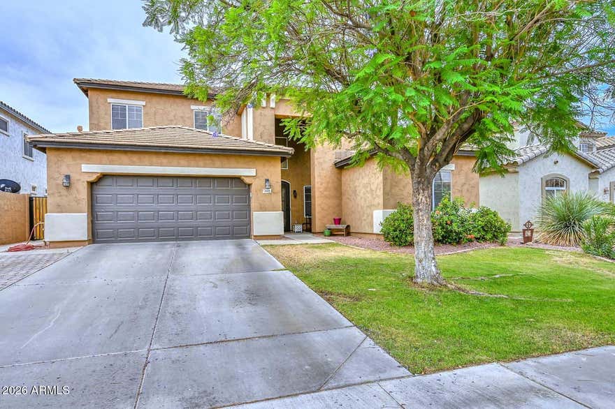 Spacious and move-in ready 5-bedroom, 3-bath home in a prime Peoria location near top-rated schools, shopping, dining, parks, and the library. Designed for functionality and flexible living, the layout includes two game/play rooms and a dedicated home office. Well maintained with major updates including newer AC units, updated flooring, fresh interior/exterior paint, remodeled primary shower, and a new water heater (2026). Energy-efficient with paid-off solar. The 3-car garage offers built-in cabinets for added storage. Enjoy outdoor living with a private pool, grass play area, and a large lot with room to park. Extended paver driveway and updated sprinkler system (2025) add convenience.