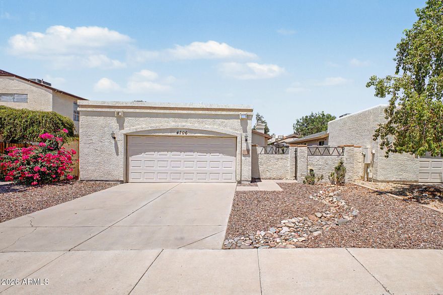 This charming North Glendale home offers a desirable split floor plan, granite countertops, cozy indoor fireplace, and a bright welcoming feel throughout. Enjoy a peaceful front garden area with rose bushes and a screened-in AZ Room off the primary suite perfect for relaxing year-round. Features include a 2-car garage, access to a community pool and greenbelt play area close by. Conveniently located near shopping, dining, schools, hiking and super easy freeway access. This is a wonderful opportunity to own a low-maintenance home full of comfort and charm!