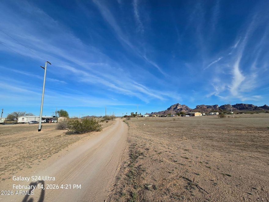 Perfect lot for building your dream home. Just under 10,000 square feet with stunning views of the Eagle Tail and Saddleback mountains. Private water service and electricity are nearby. Buyer to verify all details. Information is considered reliable but not guaranteed. Seller is also selling the adjacent lots with parcel # 506-58-120-D and 506-58-120-E