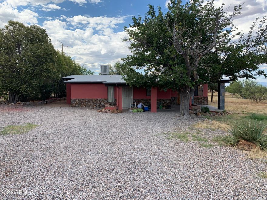 This updated 3BD/2BA/1CG 1576 sf move in ready home located in Hereford, AZ with beautiful mountain views is perfect for country living. This home includes granite counter-tops, rock back splash, walk-in shower all done in rock-tile, a family room with concrete polished floors, and a spilt floor plan. All in all this is a beautiful home that will not last long so call me today for your private showing before I put the SOLD sign on the home.