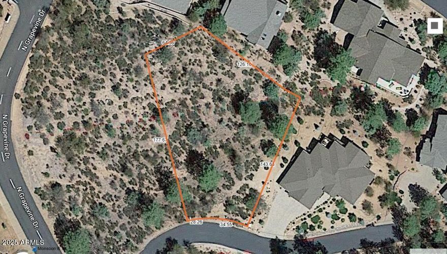 QUIET OFF MAIN GRAPEVINE STREET, INTERESTING TOPOGRAPHY WITH BOULDER OUT CROPPINGS. LOT COMPLEMENTS A VARIETY OF HOUSE PLANS.