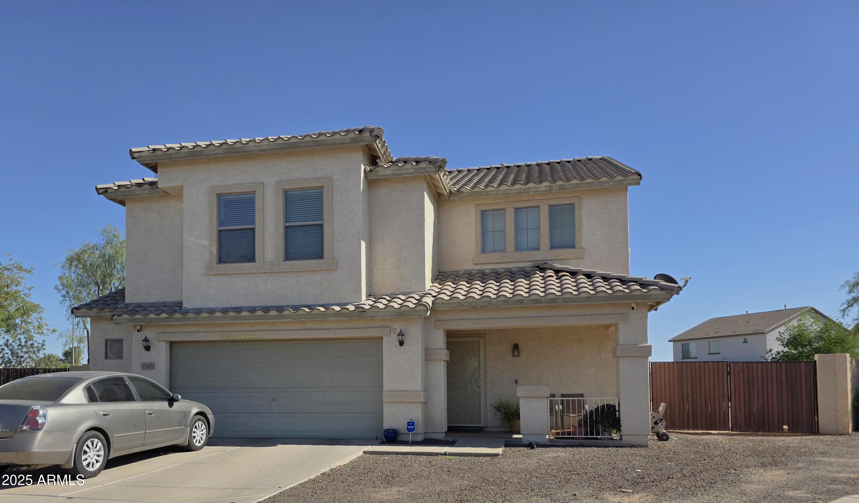 7135 W RAYMOND Street