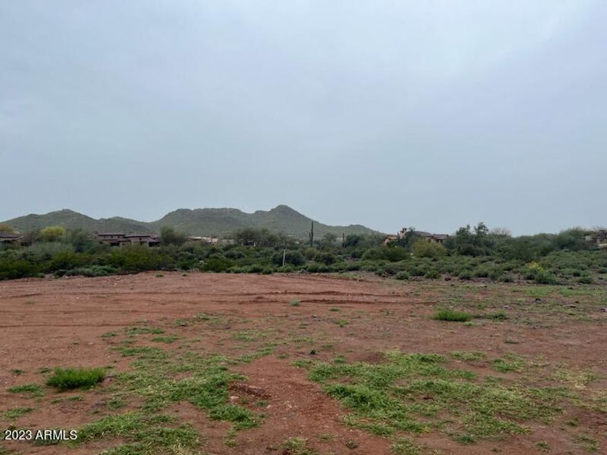 RARE FIND with this 1.25 acre lot! Boarders 2 sides of the golf course of Superstition Mountain gated subdivision with million dollar homes but NO HOA! This is one of only 4 lots with AZ water lines. All others in the area outside the gated superstition mountain subdivision and on shared wells.
Horse and detached RV garages are allowed in this GR zoning. Underground power conduits are in already.
Minimum home size is 1,700 and no manufactured homes are permitted. Underground power only. OWNER/AGENT