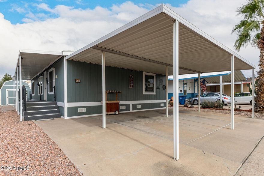 Upgraded 3-bed, 2-bath mobile home with 1,352 SF in Buffalo Ridge MHC. Vaulted ceilings, luxury vinyl floors, and brand-new carpet create a bright, open feel. Kitchen features black stainless steel appliances with dual convection oven, center island, granite-look counters, and sun-filled windows. Primary suite has walk-in closet and en-suite bath with dual sinks and large walk-in shower. Recent updates include new HVAC (2025), tankless water heater (2024), Anderson energy-efficient windows (2022), remodeled and freshly painted bathrooms with new faucets (2025), and repaired insulation/vapor barrier. Enjoy covered patio with roll-up shades, 2-car carport, storage shed, satellite dish, and low-maintenance landscaping. Community amenities include pool, clubhouse, playground, and dog park.
