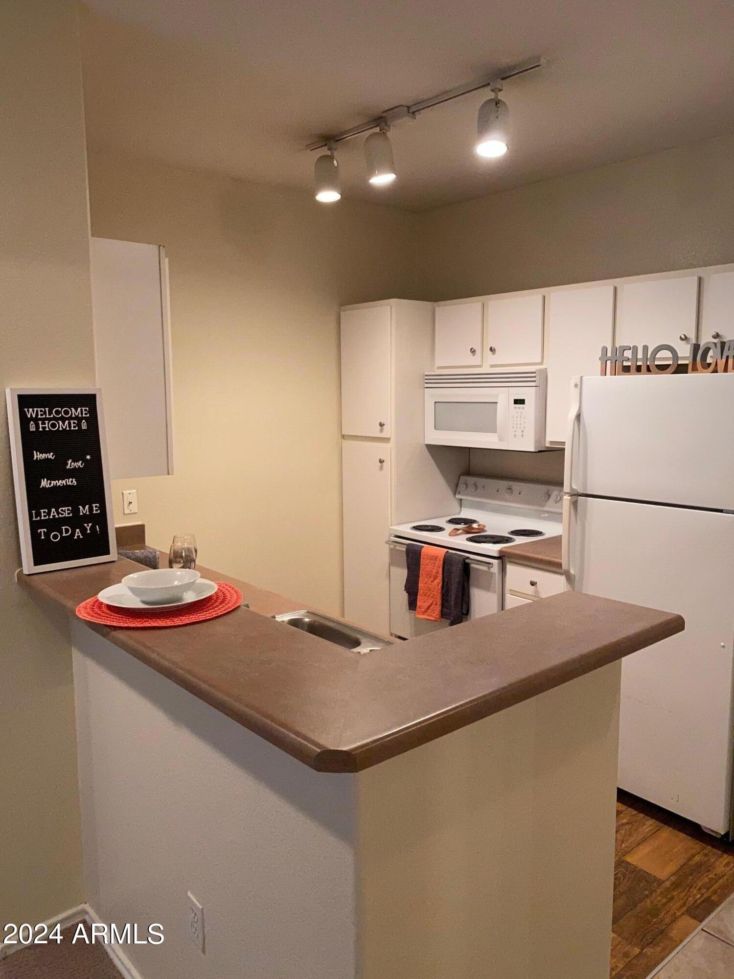 411 E Indian School Road 1