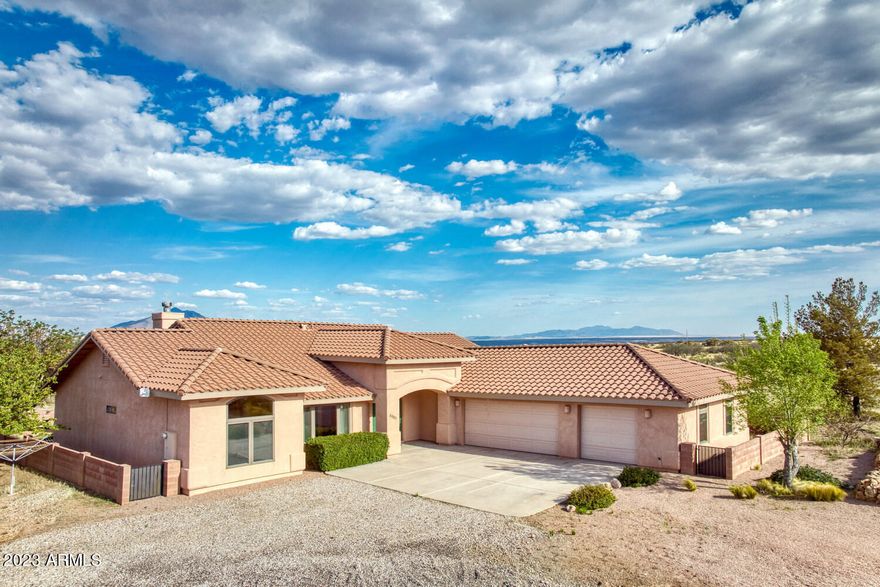 STUNNING custom Walston home on 7.964 fully fenced acres with 360 degree views of our majestic mountains!  This 3 bedroom 2 bath split floor plan with 2335 sf offers the open concept that most folks are looking for.  Gorgeous real wood double entry doors make for a grand foyer as you enter the home.  Large and open formal dining room gives way to the spacious living room with gas fireplace.  As the perfect kitchen should be, it is open to the living area with TONS of counterspace, and custom wood cabinets with pullouts.  The master bedroom is enormous and has a huge walk-in shower vanity and closet.  Both the front and backyards have been meticously maintained.  Bring the kids, bring your horses or just bring yourselves to settle into a piece of paradise!  Call today to view!