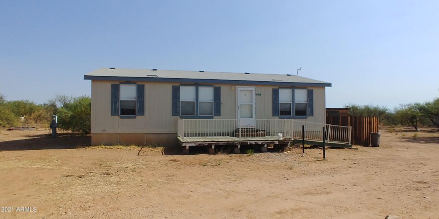 Here is a great opportunity for a reasonable priced home in todays market. There is a split floor plan and new laminate flooring in most of the house. The washer and dryer are almost new! There is wonderful natural light making this a very happy house. There is also a fenced yard in back and a peach tree too! This home is close to town and all amenities Sierra Vista offers. Even though this says it is in a flood zone, the seller pays $58.00 per year for flood insurance so it should not be an issue. Dont wait or you will miss this home.