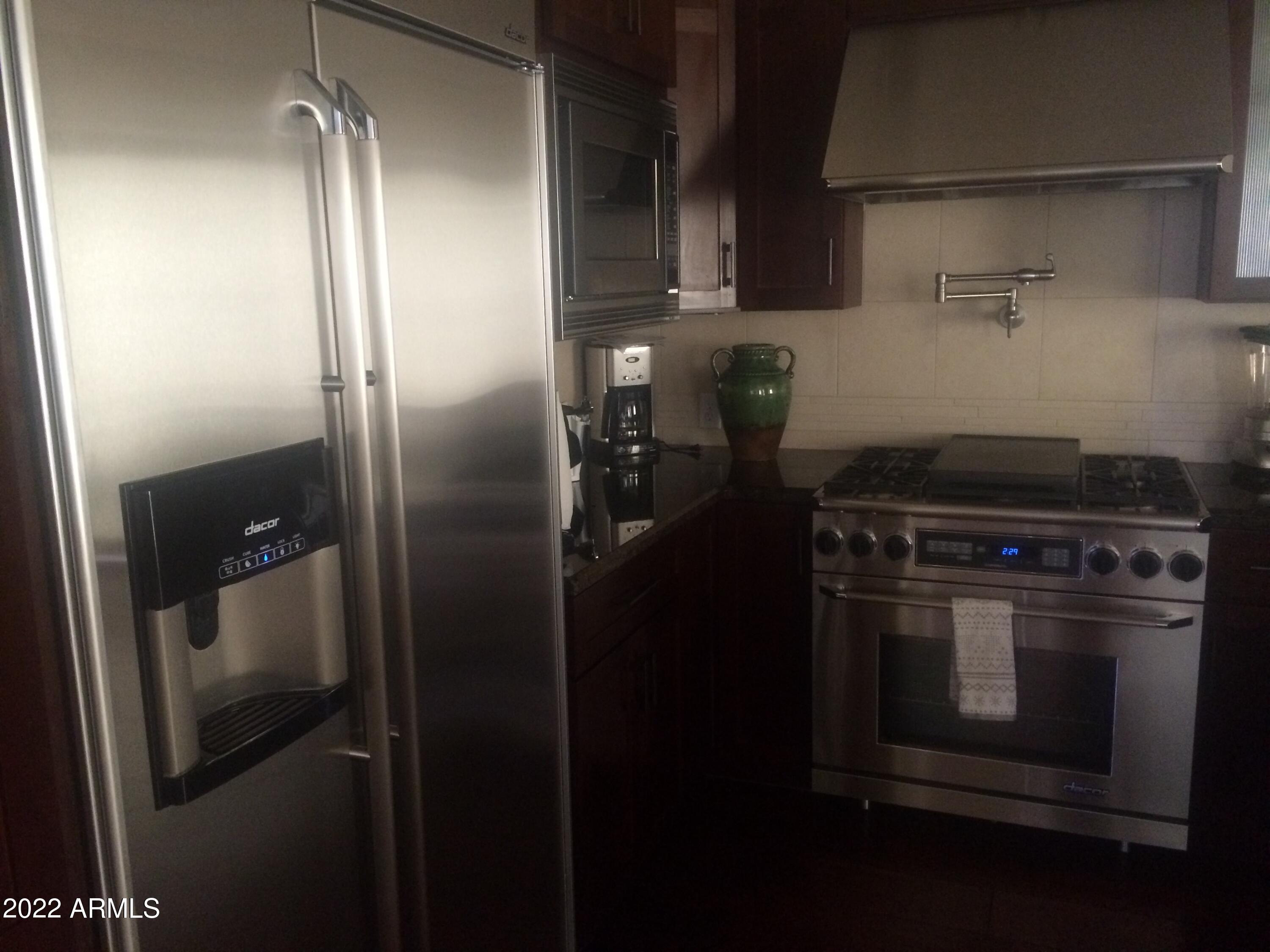 4855 N WOODMERE FAIRWAY -- 1002