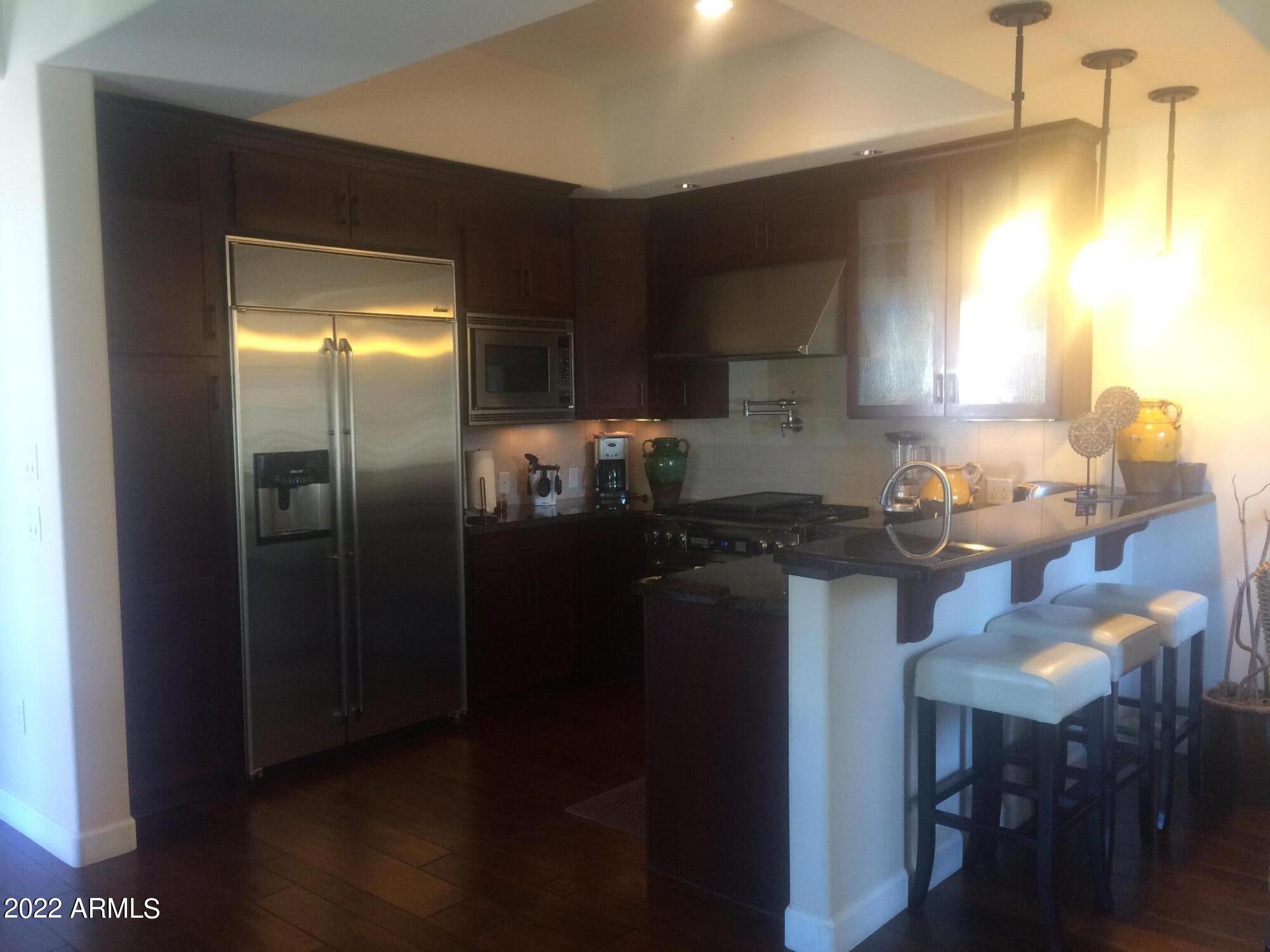 4855 N WOODMERE FAIRWAY -- 1002